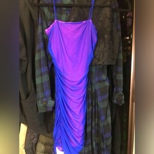 Alluring blue dress.